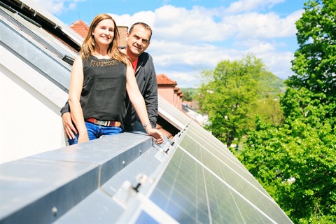 couple with solar panels on roof.jpg
